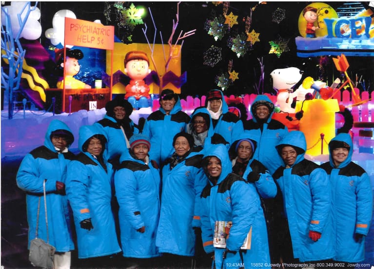 Silver Saints seniors in matching blue parkas at Christmas on Ice at the Gaylord Texan