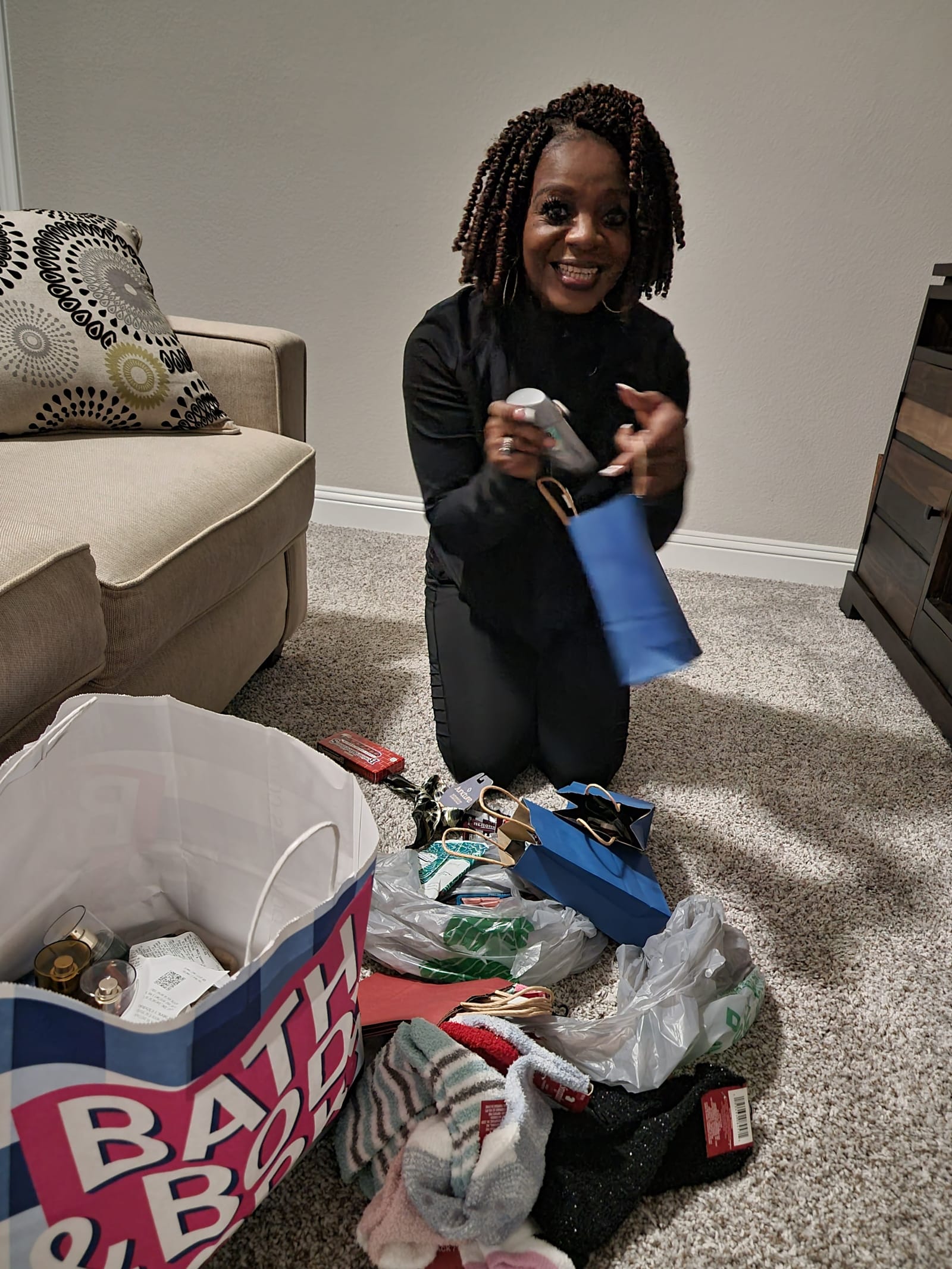 Sheila sorting donated items for a senior giveaway