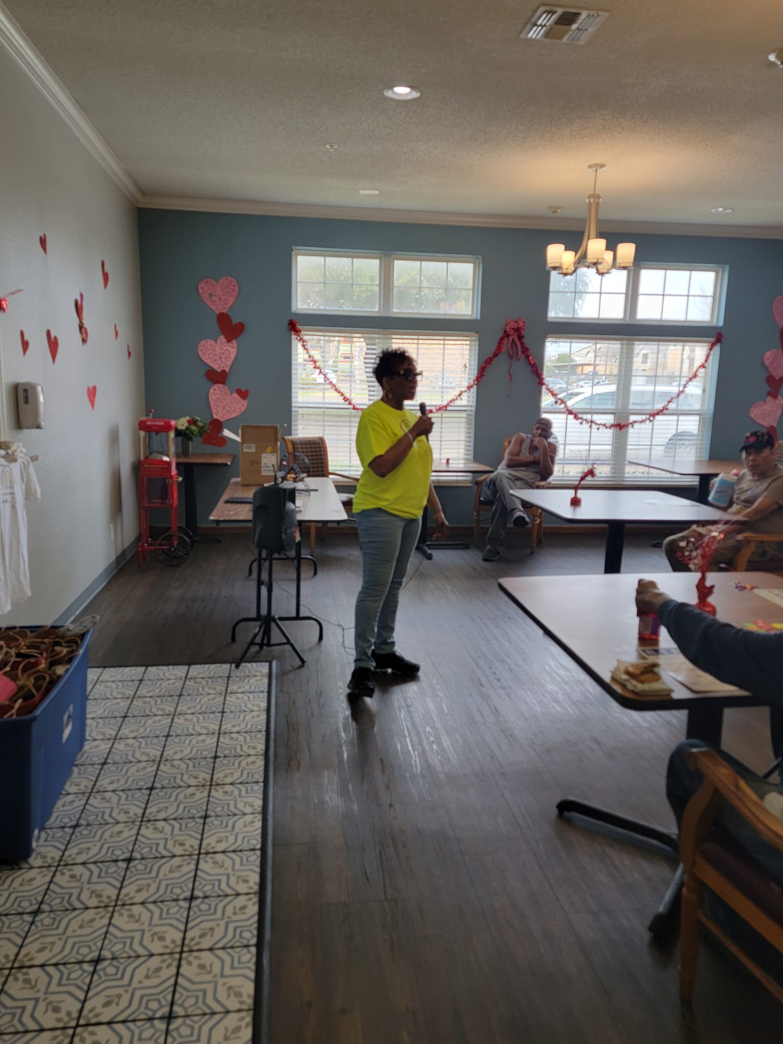 A volunteer walking the room during bingo