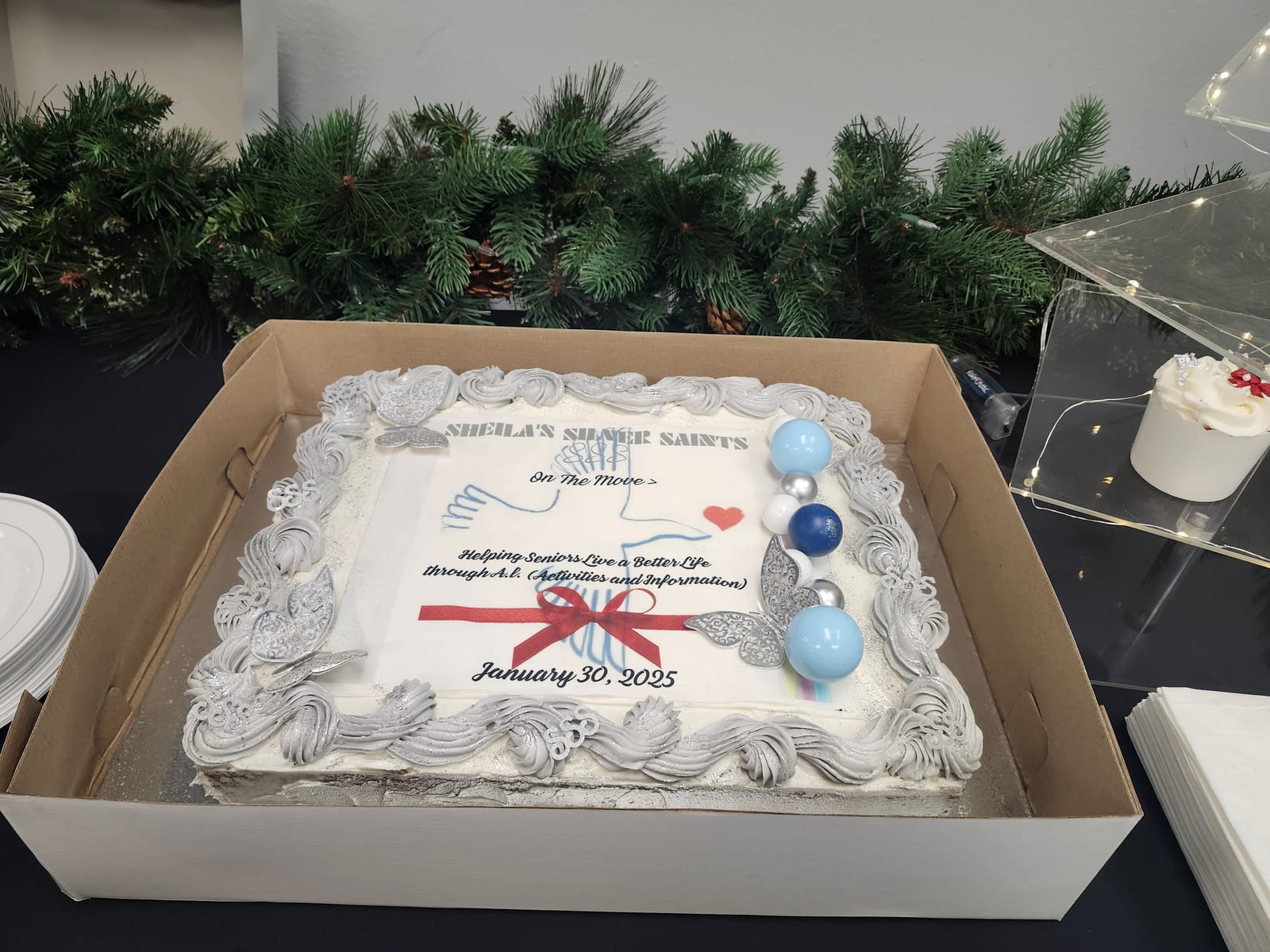 A celebration cake decorated for Sheila's Silver Saints