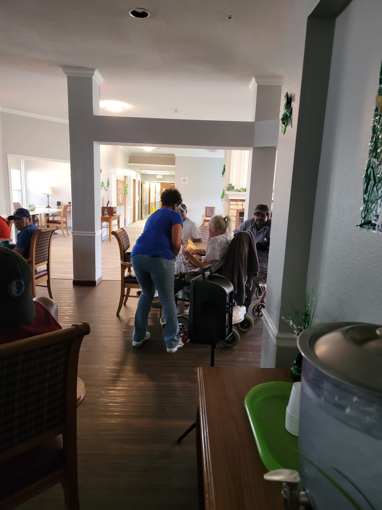 Volunteers greeting seniors at the door