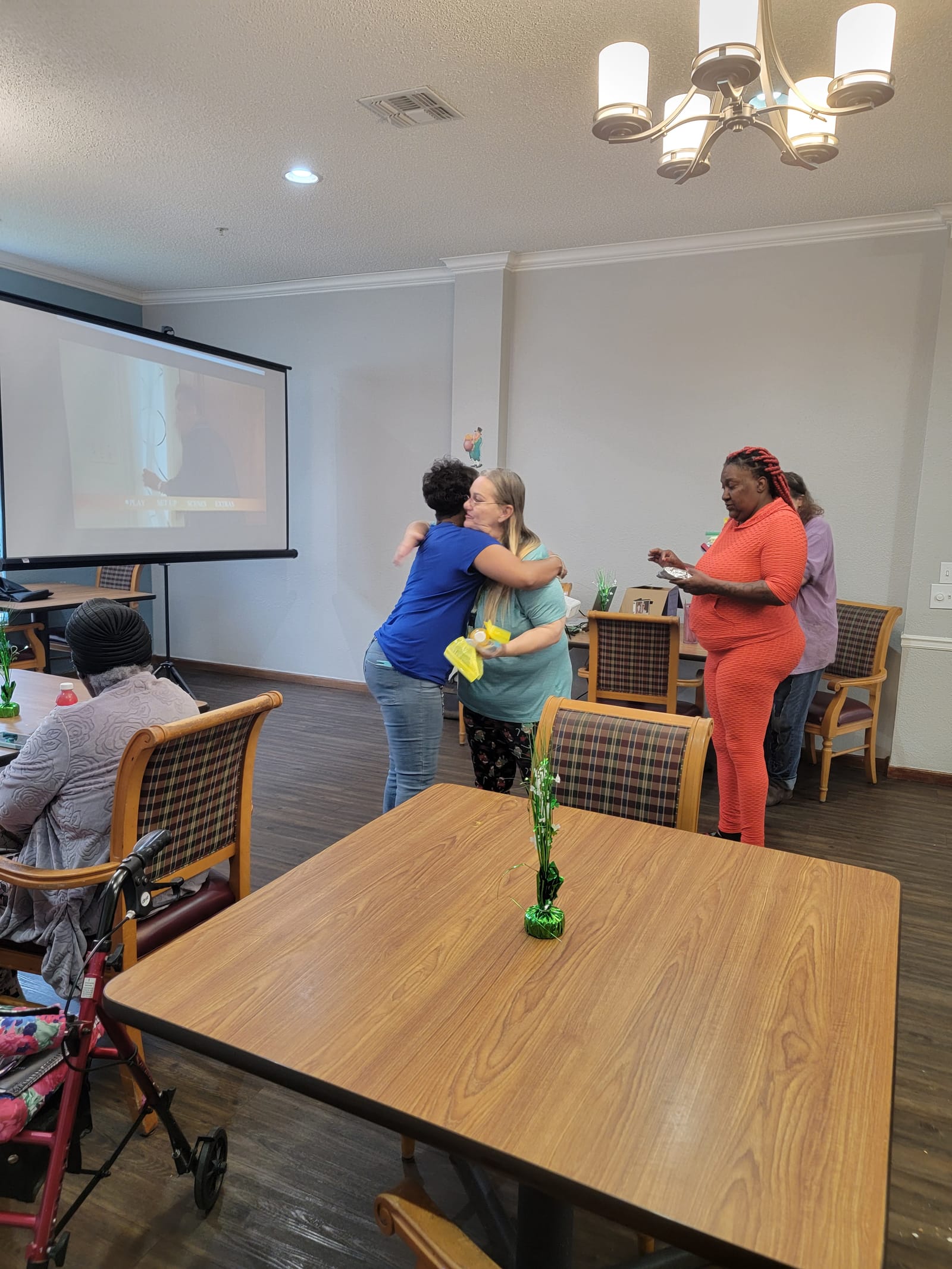 Movie day at the Senior Life Center with the projector running
